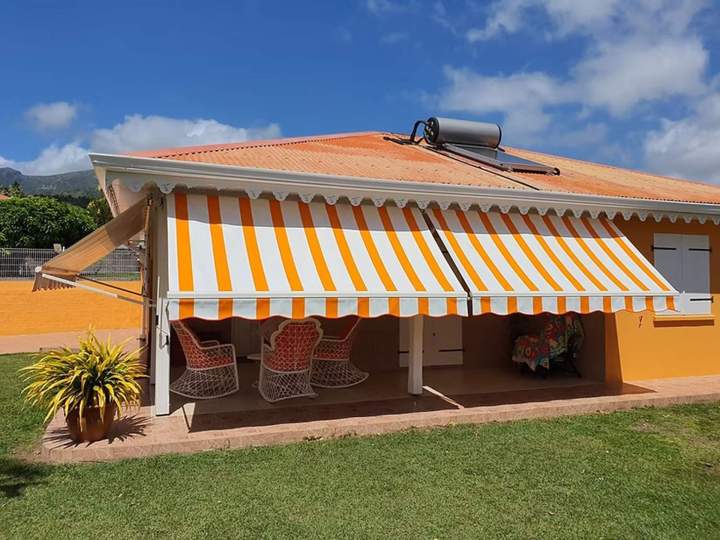 Store bras droit Martinique